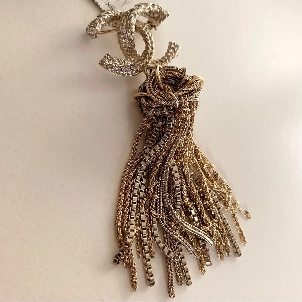 Chanel large tassel brooch in gold with crystals
